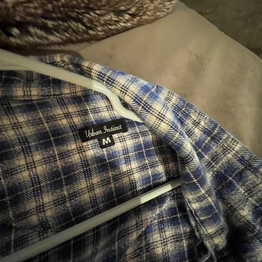Urban Instinct blue and black flannel.  Super comfy! Runs a touch large